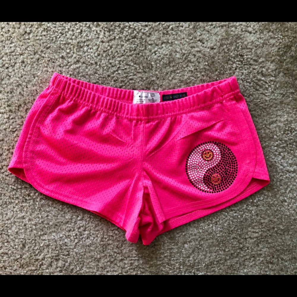Denny’s got pink yin yang mesh shorts